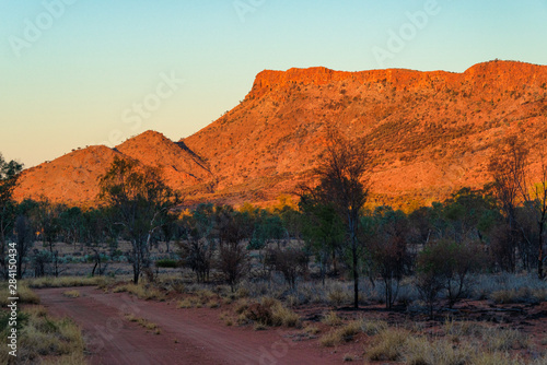 Sunset over the Heavitree Range near Alice Springs, Northern Territory, Australia photo