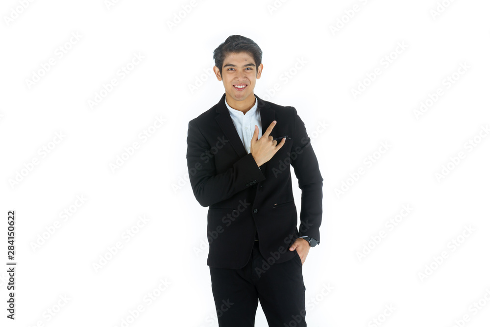 Handsome young businessman Asian caucasian wear a black suit with black hair, be a smile and standing poses by love symbol. On white background Handsome young businessman Asian caucasian wear a black suit with black hair, be a smile and standing poses by love symbol. On white background