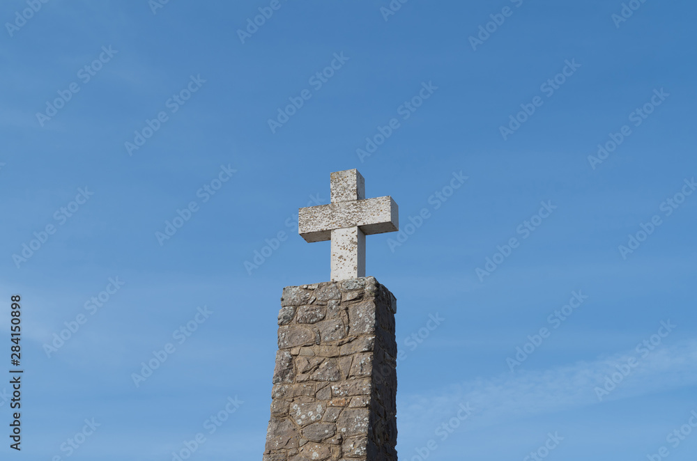 A medieval cross close up at Cape Roca in Lisbon, Portugal