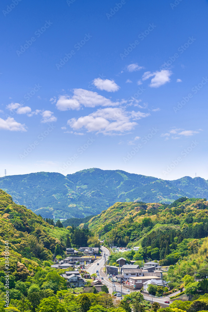 Takeo city with blue sky, skyline top view from Mifuneyama Rakuen in Saga Prefecture, Kashima, Kyushu Japan. Takeo city with blue sky, skyline top view from Mifuneyama Rakuen in Saga Prefecture, Kashima, Kyushu Japan.
