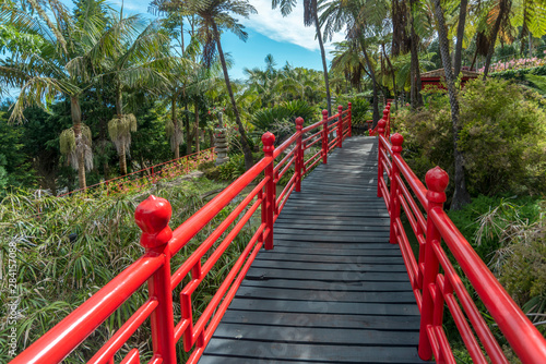 red fence pathway