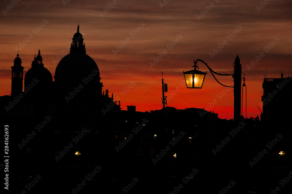 Venice winter mysterious romantic: The Basilica of Santa Maria della Salute at sunset