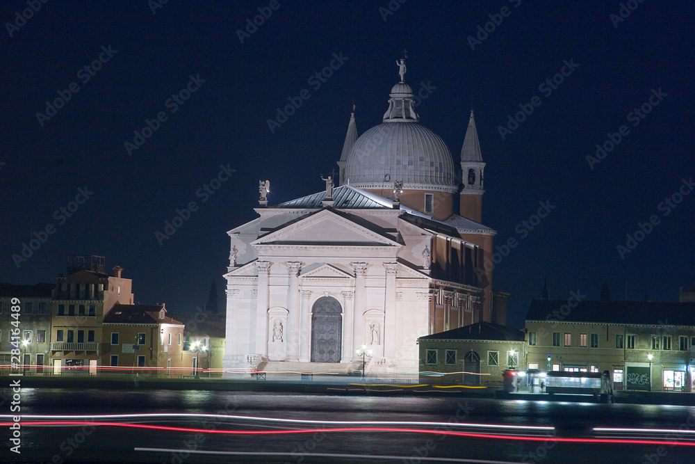 Venice winter mysterious romantic: The Basilica of Santa Maria della Salute at sunset, lights, nights