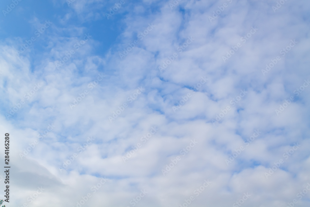 White and lush clouds in the blue sky White and lush clouds in the blue sky