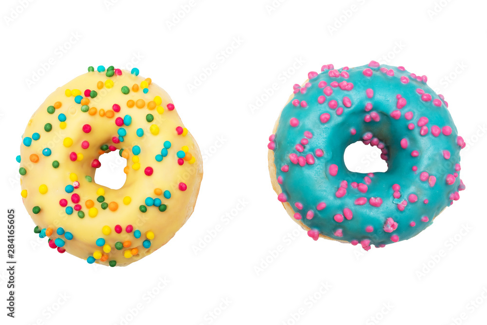 Blue and yellow donuts, two donuts with bright sprinkles, isolated, background, food concept Blue and yellow donuts, two donuts with bright sprinkles, isolated, background, food concept