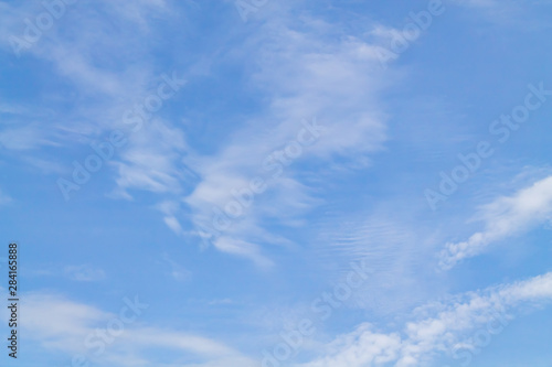 White and lush clouds in the blue sky