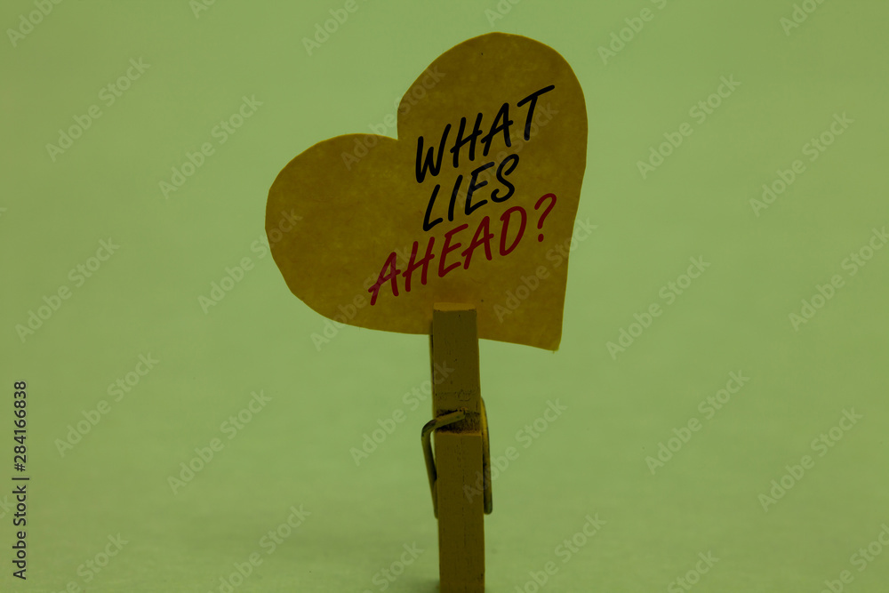 Handwriting text What Lies Ahead question. Concept meaning Asking for  information about something on the way Celadon color background paper clip  hold love heart for loving with words Stock Photo | Adobe
