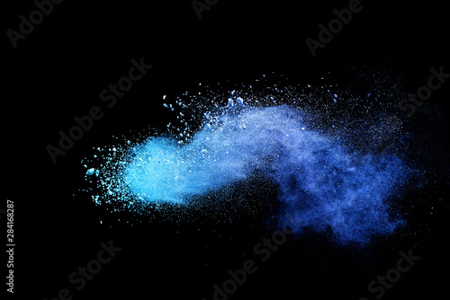 Fotografie, Tablou Blue powder explosion on black background