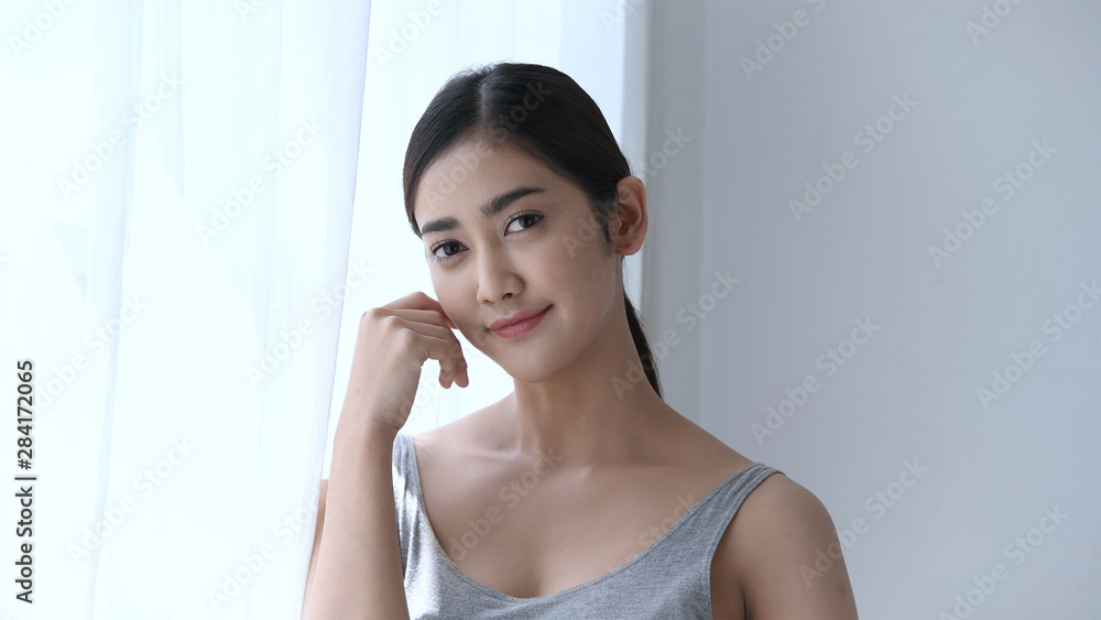 Holiday concept. Asian girls are fondling her face with tenderness. Holiday concept. Asian girls are fondling her face with tenderness.