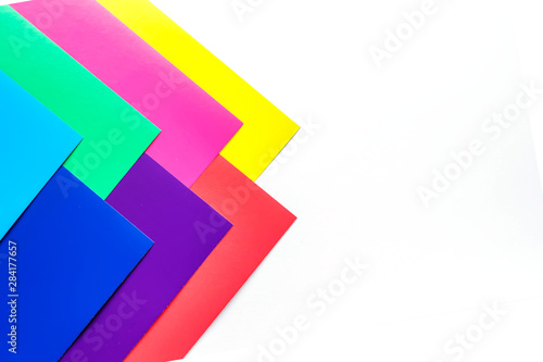 Set of multicolored paper isolated on white background. Copy space for text .