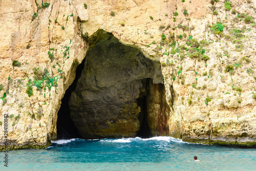 Dwerja, the inland sea, Gozo, Malta. The cave joins with the Mediterranean sea on the other side of the cliff.