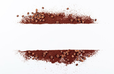 Ground coffee and beans on white background.