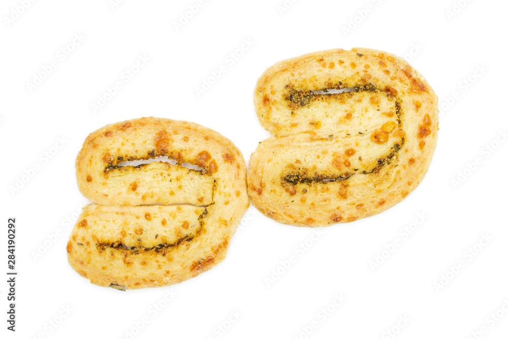 Group of two whole crisp savory cheese palmier flatlay isolated on white background Group of two whole crisp savory cheese palmier flatlay isolated on white background