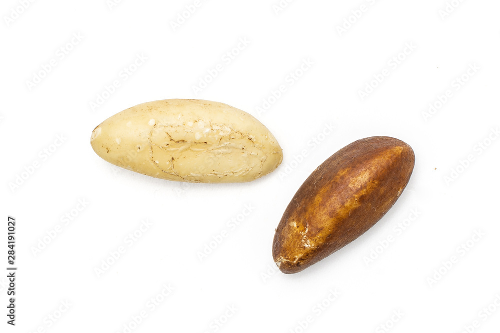 Group of two whole unshelled brazil nut flatlay isolated on white background Group of two whole unshelled brazil nut flatlay isolated on white background