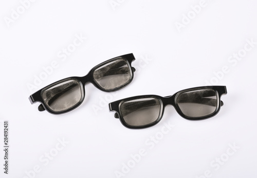 Dusty eyeglasses on white background