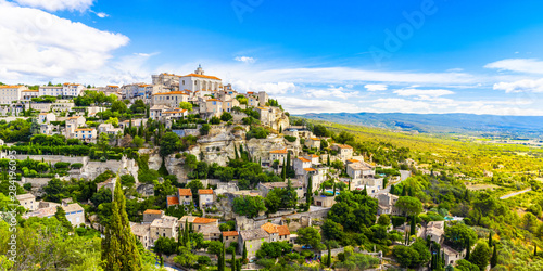 View of Gordes, a small medieval town in Provence, France. A view of the ledges of the roof of this beautiful village and landscape. photo