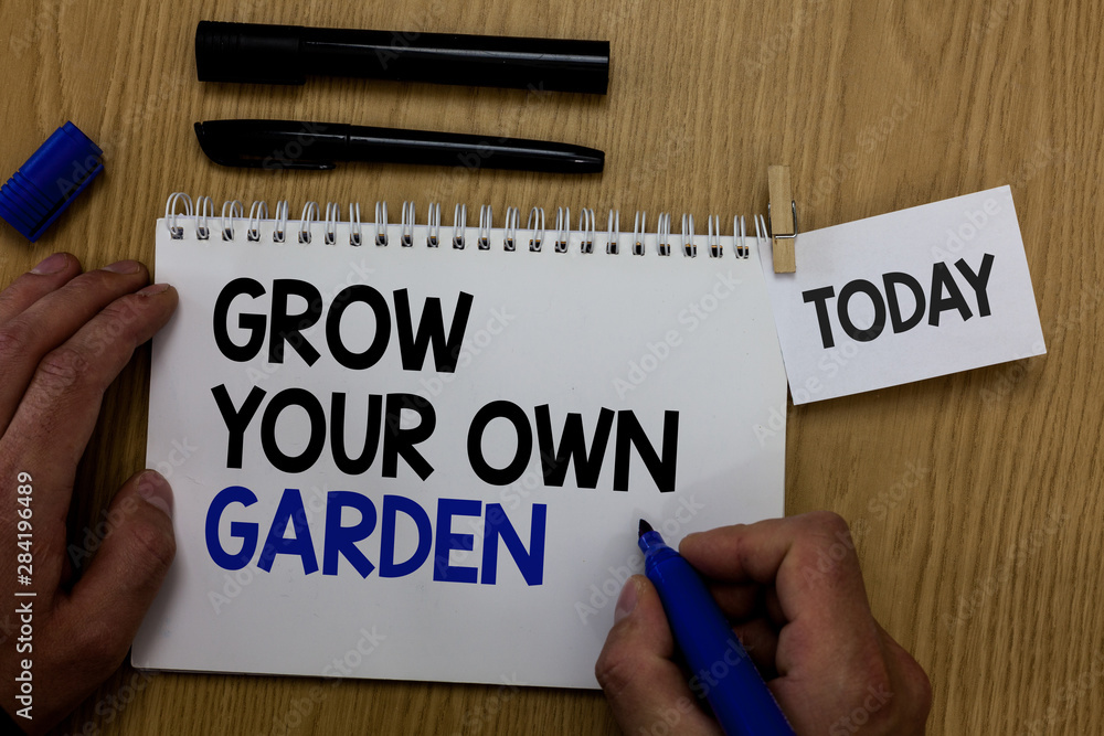 Word writing text Grow Your Own Garden. Business concept for Organic Gardening collect personal vegetables fruits Hand hold pen notepad with words paperclip grip note paper woody base black pen Word writing text Grow Your Own Garden. Business concept for Organic Gardening collect personal vegetables fruits Hand hold pen notepad with words paperclip grip note paper woody base black pen