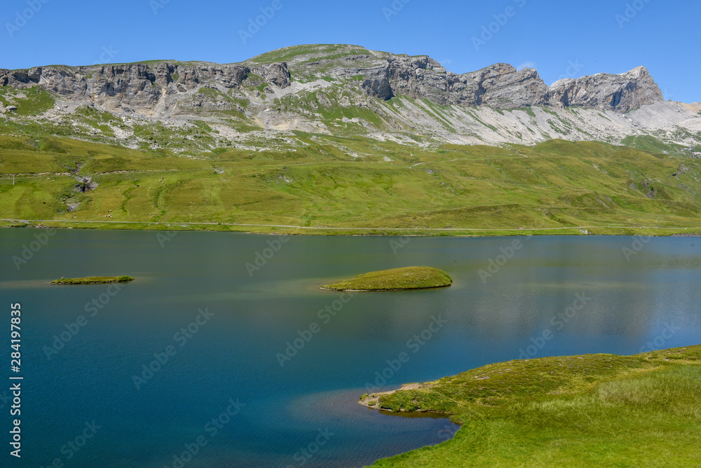 View at lake Tannensee over Engelberg in the Swiss alps