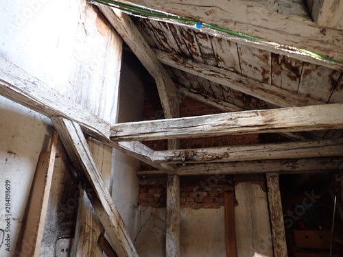 old wooden roof beam structure