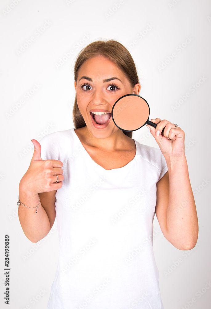 forever young skin look good concept, dermatology and beauty products results, young girl holding magnifier over her face, skin close up, clean and perfect, happy and smile forever young skin look good concept, dermatology and beauty products results, young girl holding magnifier over her face, skin close up, clean and perfect, happy and smile