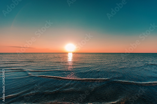 sunrise in the sea © Ruslan Ivantsov