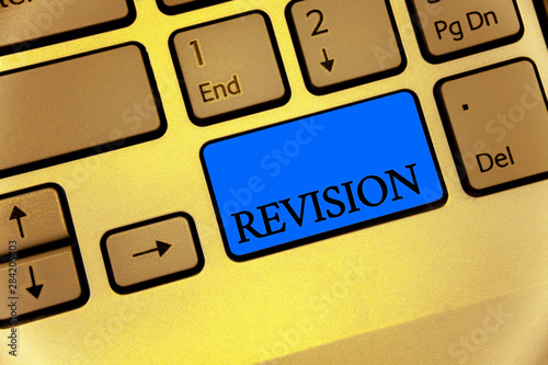 Writing note showing Revision. Business photo showcasing Rechecking Before Proceeding Self Improvement Preparation Keyboard brown key yellow laptop computer keypad notebook netbook photo