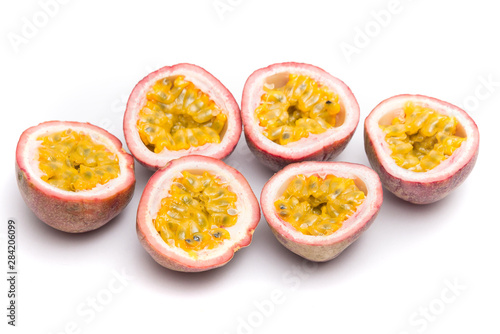 Half cut passion fruit isolated on white background, sour fruit, fruit background, healthy food
