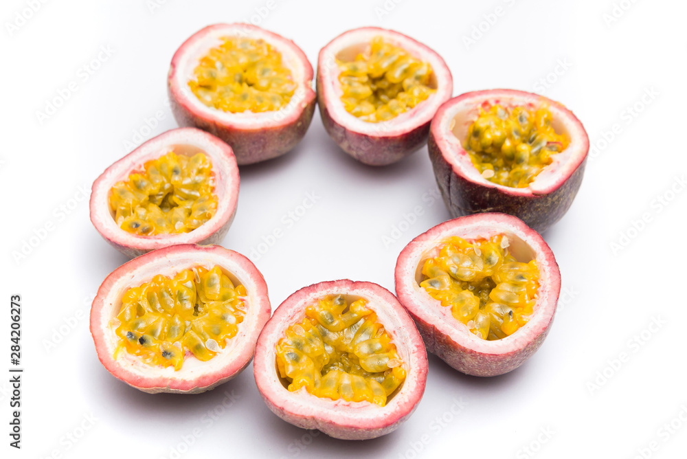 Half cut passion fruit isolated on white background, sour fruit, fruit background, healthy food