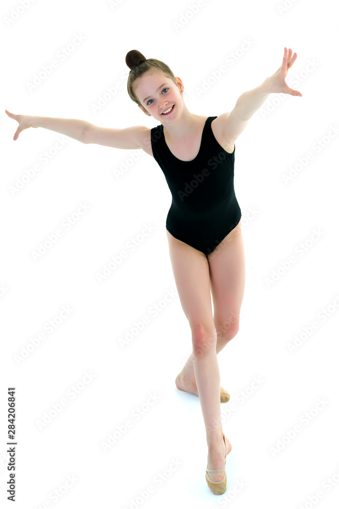 The gymnast prepares to perform the exercise. The gymnast prepares to perform the exercise.