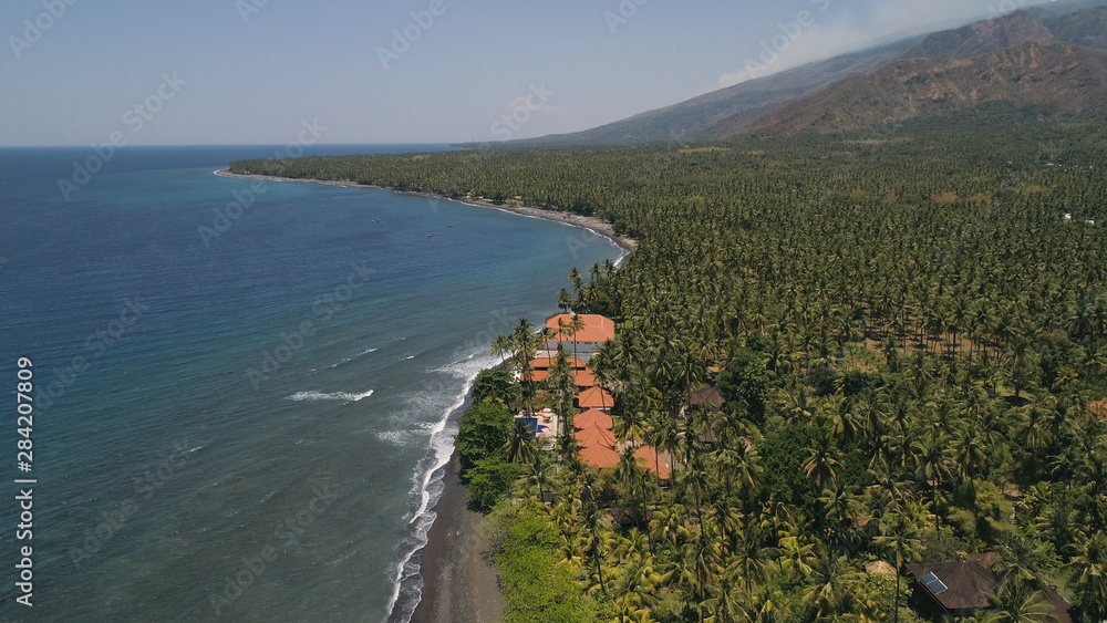 aerial seascape luxury hotel on beach background mountainss in tropical resort. Bali,Indonesia, travel concept.