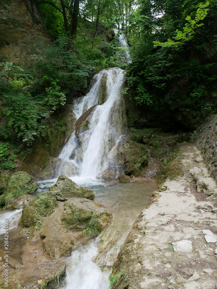 waterfall in the mountains near Lake Hamory waterfall in the mountains near Lake Hamory