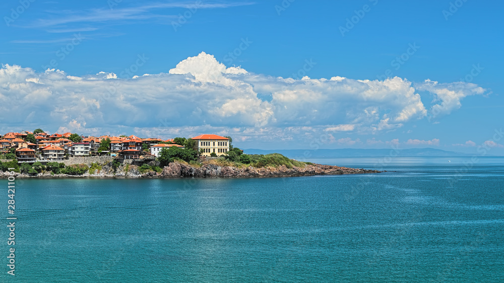 The east cape of Sozopol Old Town (former ancient town of Apollonia) with building of Art Gallery, Bulgaria. Sozopol is the famous seaside resort on the Bulgarian Black Sea Coast.
