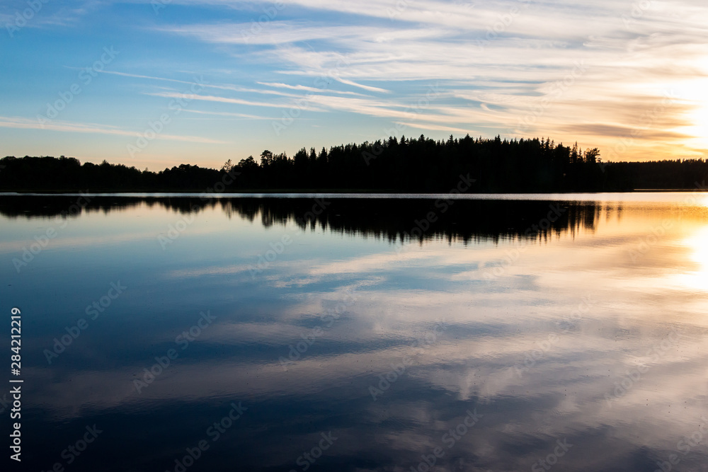 Beautiful evening view during the blue hour over the Safssjon  lake in the region Dalarna in the middle of Sweden 