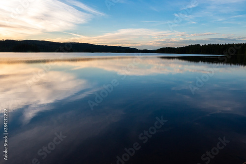 Beautiful evening view during the blue hour over the Safssjon lake in the region Dalarna in the middle of Sweden 