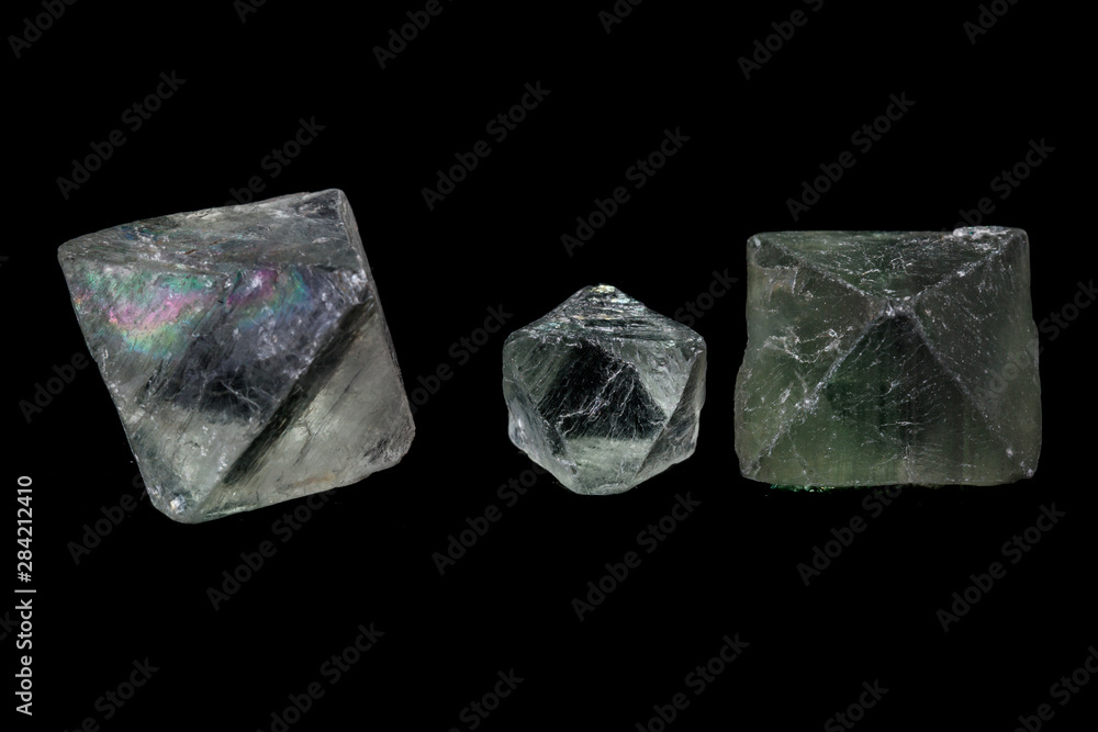 macro mineral fluorite stone on balck background macro mineral fluorite stone on balck background