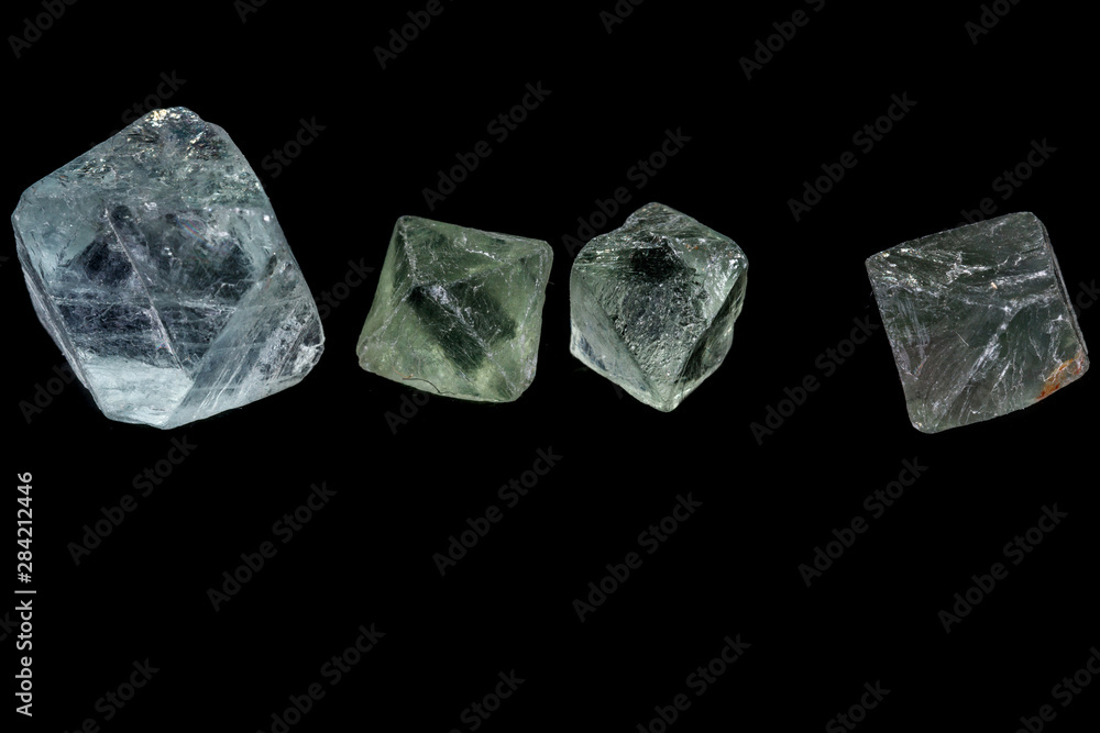 macro mineral fluorite stone on balck background macro mineral fluorite stone on balck background