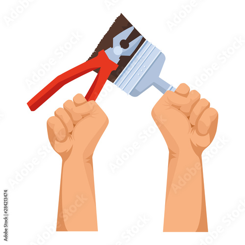 Construction workers hands holding tools
