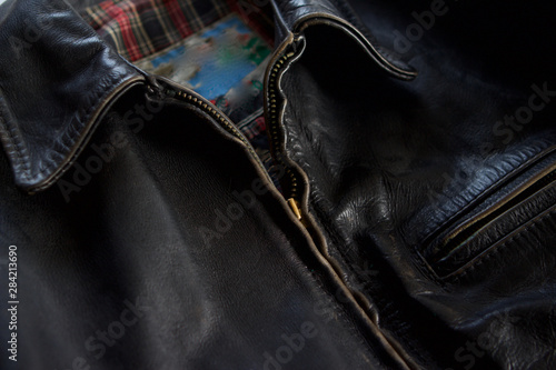 Detail of  black leather biker jacket collar