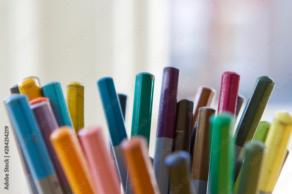 Coloured Pencils backlit in abstract manner Coloured Pencils backlit in abstract manner