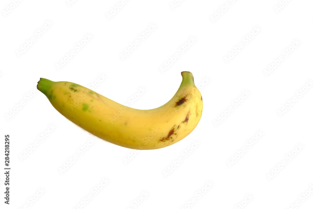 A single yellow banana on white isolated background and copy space 