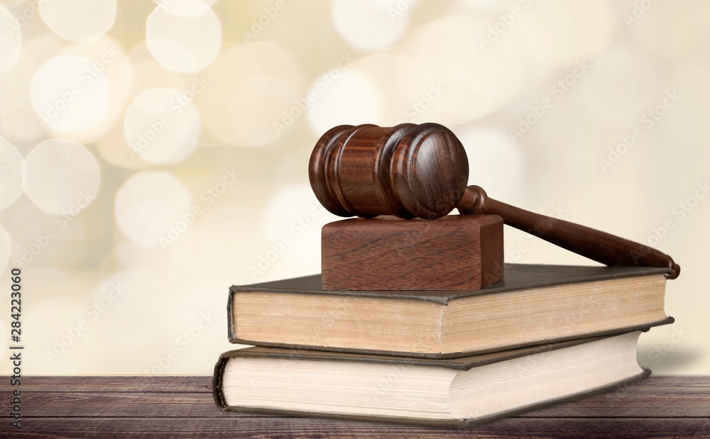Justice Scales and books and wooden gavel on table. Justice concept Justice Scales and books and wooden gavel on table. Justice concept
