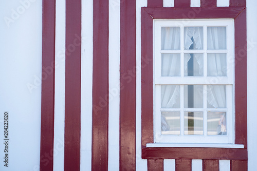 Red striped house, traditional house of Aveiro. Fisherman's village Costa Nova. Aveiro. Portugal.