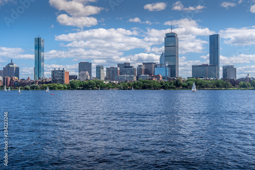 Boston skyline from the Charles river and Cambridge with sail boats