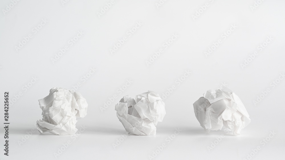 Three paper crumpled a symbol for three concept ideas