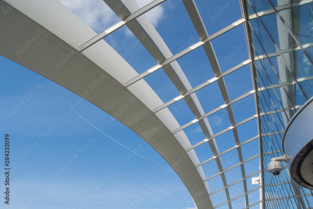 modern office building with blue sky and clouds modern office building with blue sky and clouds