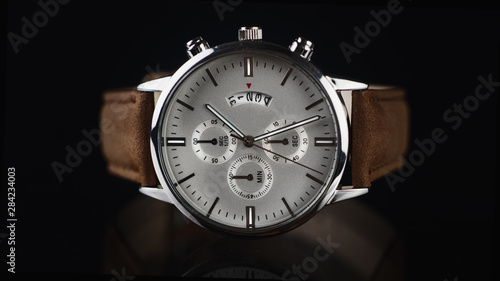 Wallpaper Mural close up of wrist watch for men on dark background Torontodigital.ca