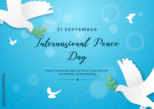 International peace day vector illustrator in blue bokeh background