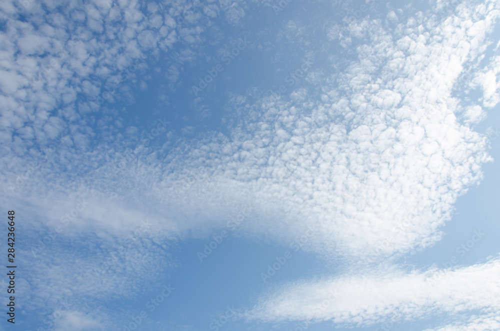 Beautiful cumulus clouds on a blue sky on a sunny day. Beautiful cumulus clouds on a blue sky on a sunny day.