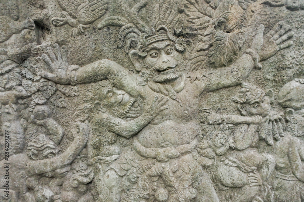 Ancient stone carving in Ubud Bali Indonesia