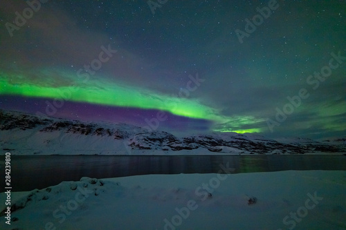 Aurora above the Fjord